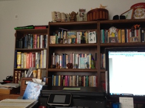 Inspired while writing by "wall of books" and knick-knacks across the room.